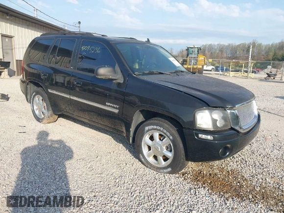 2006 GMC Envoy SLE with VIN 1GKDT13S262204960, listed as a IAAI auction lot 42045236 with 183,338 mi miles. Bid and sale history available at carsss.com. Image 1.