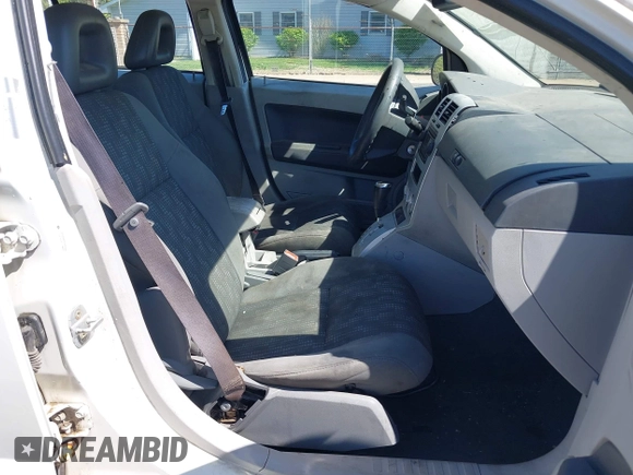 2007 Dodge Caliber SXT with VIN 1B3HB48BX7D160420, listed as a IAAI auction lot 42133771 with 169,796 mi miles and . Bid and sale history available at DreamBid. Image 5.