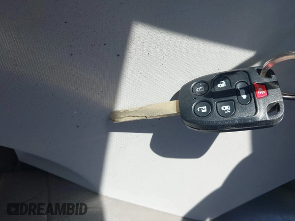 2012 Honda Odyssey EX-L with VIN 5FNRL5H60CB095086, listed as a IAAI auction lot 42251330 with 144,232 mi miles and . Bid and sale history available at DreamBid. Image 11.