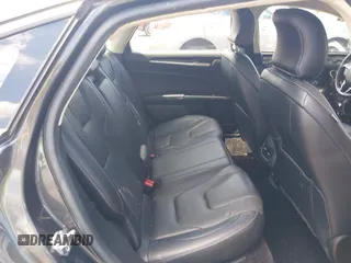 2017 Ford Fusion Titanium z VIN 3FA6P0SUXHR184919, wystawiony jako IAAI lot #42258918 z przebiegiem Nie podano mil oraz . Historia ofert i sprzedaży dostępna na DreamBid. Obrazek 8.