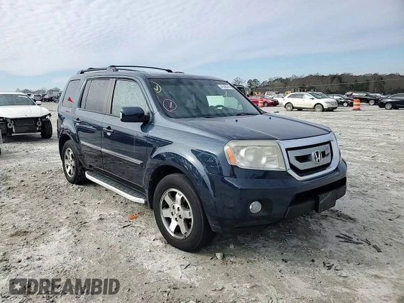 2011 Honda Pilot Touring with VIN 5FNYF4H96BB077391, listed as a Copart auction lot 41520315 with 196,291 mi miles and Salvage Title. Bid and sale history available at DreamBid. Image 12.
