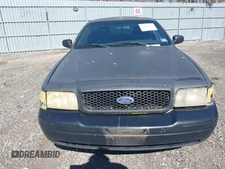 2011 Ford Crown Victoria with VIN 2FABP7AV9BX121739, listed as a IAAI auction lot 41763311 with 215,727 mi miles. Bid and sale history available at carsss.com. Image 12.