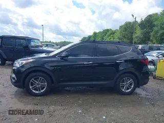 2017 Hyundai Santa Fe 2.4L z VIN 5NMZU3LB5HH043545, wystawiony jako IAAI lot #42244550 z przebiegiem 84 464 mil mil oraz . Historia ofert i sprzedaży dostępna na DreamBid. Obrazek 15.