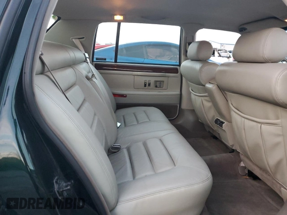 1995 Cadillac DeVille z VIN 1G6KD52B0SU252838, wystawiony jako Copart lot #87642595 z przebiegiem 72 847 mil mil oraz Szkoda całkowita • Salvage title. Historia ofert i sprzedaży dostępna na DreamBid. Obrazek 10.