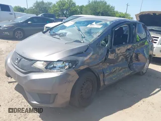 2016 Honda Fit LX z VIN JHMGK5H56GX041075, wystawiony jako IAAI lot #42023299 z przebiegiem 145 658 mil mil oraz . Historia ofert i sprzedaży dostępna na DreamBid. Obrazek 17.