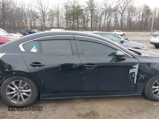 2021 Mazda 3 S с VIN 3MZBPAAL8MM201924, выставлен на аукционе IAAI как лот 40977248 с пробегом 89 894 миль миль и . История ставок и продаж доступна на DreamBid. Изображение 14.
