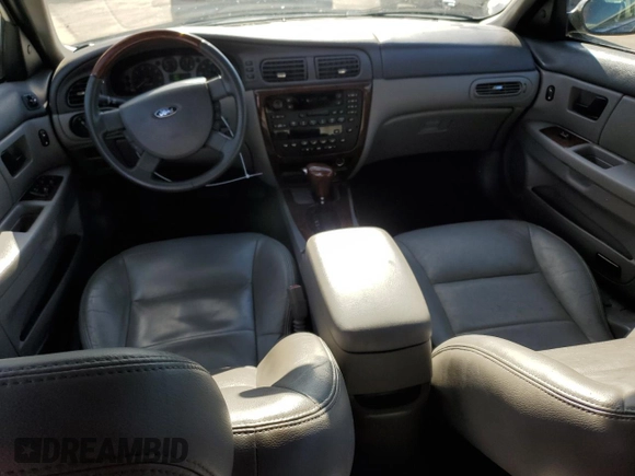 2005 Ford Taurus z VIN 1FAHP59U15A158162, wystawiony jako Copart lot #81109994 z przebiegiem 81 196 mil mil oraz Czysty tytuł • Clean title. Historia ofert i sprzedaży dostępna na DreamBid. Obrazek 8.