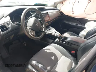 2018 Honda Clarity Plug-In Hybrid with VIN JHMZC5F10JC014054, listed as a IAAI auction lot 41932195 with 100,643 mi miles. Bid and sale history available at carsss.com. Image 5.
