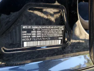 2005 Mercedes-Benz E-Class 5.5L AMG with VIN WDBUF76J25A746426, listed as a Copart auction lot 85879584 with 134,055 mi miles and Salvage Title. Bid and sale history available at carsss.com. Image 12.