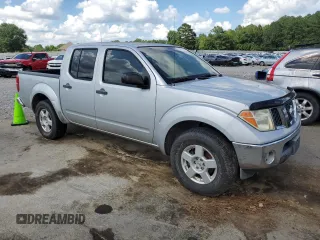 2007 Nissan Frontier Nismo with VIN 1N6AD07U27C422200, listed as a Copart auction lot 64451555 with 241,534 mi miles and Clean title. Bid and sale history available at DreamBid. Image 4.