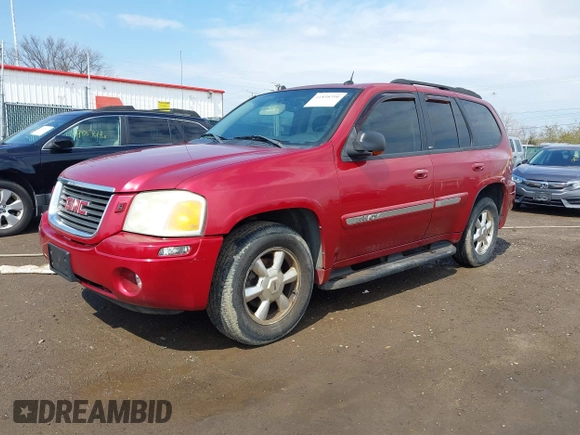 2005 GMC Envoy SLE with VIN 1GKDT13S252127604, listed as a IAAI auction lot 41898390 with 210,655 mi miles. Bid and sale history available at carsss.com. Image 17.