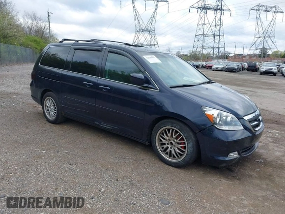 2007 Honda Odyssey EX-L with VIN 5FNRL38737B031255, listed as a IAAI auction lot 42040035 with 233,369 mi miles. Bid and sale history available at carsss.com. Image 1.