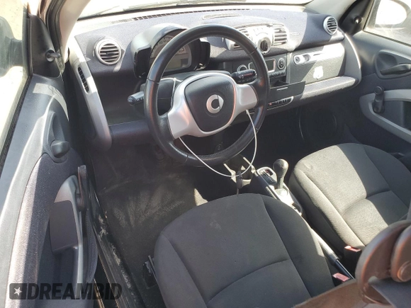 2015 Smart fortwo Passion z VIN WMEEJ3BA0FK802623, wystawiony jako Copart lot #55082215 z przebiegiem Nie podano mil oraz Tytuł czysty. Historia ofert i sprzedaży dostępna na DreamBid. Obrazek 8.