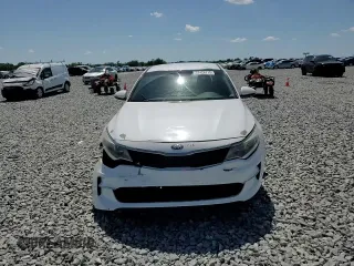2016 Kia Optima LX z VIN 5XXGT4L33GG069924, wystawiony jako Copart lot #57426715 z przebiegiem 139 047 mil mil oraz Szkoda całkowita • Salvage title. Historia ofert i sprzedaży dostępna na DreamBid. Obrazek 13.