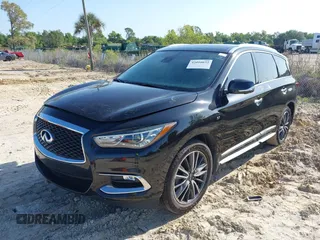 2020 Infiniti QX60 Pure with VIN 5N1DL0MN4LC539573, listed as a IAAI auction lot 42010032 with 104,507 mi miles and . Bid and sale history available at DreamBid. Image 2.