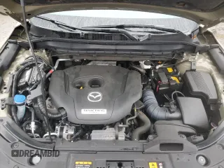 2024 Mazda CX-5 2.5 Carbon Turbo with VIN JM3KFBAY5R0419375, listed as a Copart auction lot 82000304 with 7,247 mi miles and Salvage Title. Bid and sale history available at carsss.com. Image 12.
