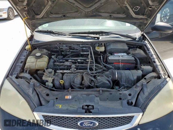 2006 Ford Focus S z VIN 1FAFP34N26W145565, wystawiony jako Copart lot #60091675 z przebiegiem 251 850 mil mil oraz Szkoda całkowita • Salvage title. Historia ofert i sprzedaży dostępna na DreamBid. Obrazek 11.