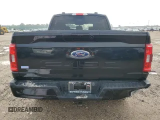 2023 Ford F-150 XL with VIN 1FTEW1C59PFC27499, listed as a Copart auction lot 54453255 with 58,554 mi miles and Salvage title. Bid and sale history available at DreamBid. Image 6.