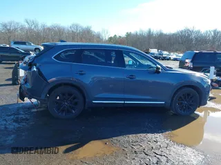 2021 Mazda CX-9 Grand Touring with VIN JM3TCBDY5M0506632, listed as a IAAI auction lot 41589264 with 50,026 mi miles and . Bid and sale history available at carsss.com. Image 13.
