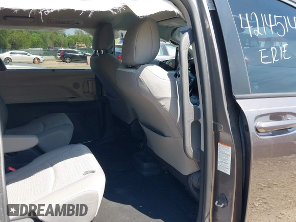 2021 Toyota Sienna LE with VIN 5TDKSKFC4MS004345, listed as a IAAI auction lot 42145140 with 103,544 mi miles and . Bid and sale history available at DreamBid. Image 8.