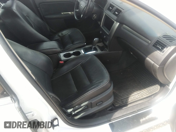 2010 Ford Fusion Hybrid z VIN 3FADP0L31AR387443, wystawiony jako IAAI lot #40034145 z przebiegiem 153 847 mil mil oraz . Historia ofert i sprzedaży dostępna na DreamBid. Obrazek 5.