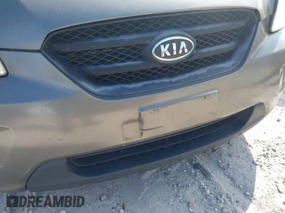 2009 Kia Rondo LX with VIN KNAFG528797267899, listed as a IAAI auction lot 42020740 with 141,113 mi miles. Bid and sale history available at carsss.com. Image 6.