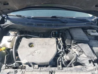 2014 Mazda 5 Sport with VIN JM1CW2BL5E0167153, listed as a IAAI auction lot 41790276 with 243,565 mi miles. Bid and sale history available at carsss.com. Image 10.