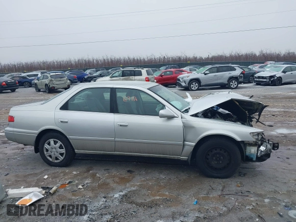 2001 Toyota Camry CE with VIN JT2BG22KX10540738, listed as a IAAI auction lot 41516912 with 116,733 mi miles. Bid and sale history available at carsss.com. Image 14.