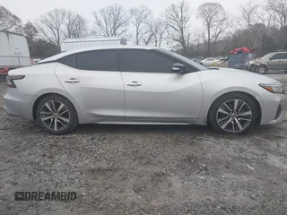2019 Nissan Maxima Platinum z VIN 1N4AA6AV6KC372254, wystawiony jako IAAI lot #41519515 z przebiegiem 124 326 mil mil oraz . Historia ofert i sprzedaży dostępna na DreamBid. Obrazek 13.