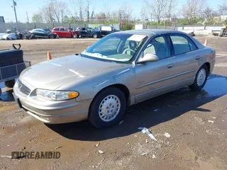 1997 Buick Regal LS with VIN 2G4WB52K9V1435882, listed as a IAAI auction lot 41974673 with 64,402 mi miles. Bid and sale history available at carsss.com. Image 2.