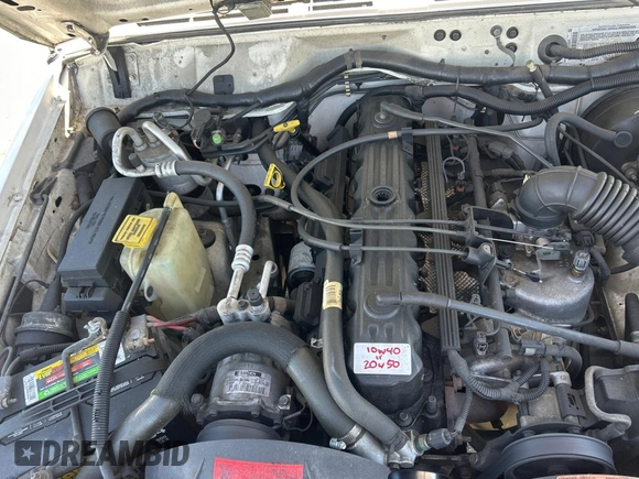 2000 Jeep Cherokee Classic with VIN 1J4FF58S4YL219673, listed as a Copart auction lot 48809075 with 198,334 mi miles and Salvage Title. Bid and sale history available at carsss.com. Image 7.
