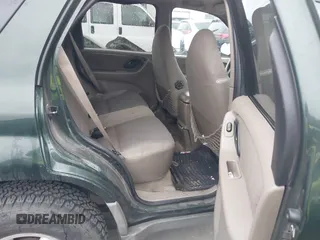 2001 Ford Escape XLT with VIN 1FMCU03101KC25039, listed as a IAAI auction lot 41900122 with 218,126 mi miles. Bid and sale history available at carsss.com. Image 8.