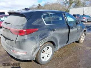 2018 Kia Sportage LX with VIN KNDPM3AC5J7380328, listed as a IAAI auction lot 41554927 with 197,778 mi miles. Bid and sale history available at carsss.com. Image 4.