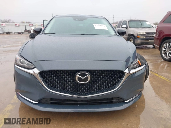 2021 Mazda 6 Carbon Edition with VIN JM1GL1WY0M1600414, listed as a IAAI auction lot 41551393 with 36,780 mi miles and . Bid and sale history available at DreamBid. Image 12.