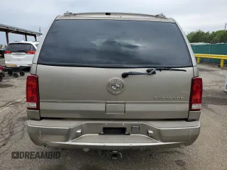 2003 Cadillac Escalade z VIN 1GYEK63N03R217374, wystawiony jako Copart lot #58380765 z przebiegiem 212 454 mil mil oraz Szkoda całkowita • Salvage title. Historia ofert i sprzedaży dostępna na DreamBid. Obrazek 6.