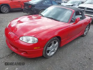 2004 Mazda MX-5 Miata LS with VIN JM1NB353440401450, listed as a IAAI auction lot 42542318 with 106,950 mi miles and . Bid and sale history available at DreamBid. Image 2.
