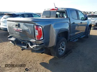 2021 GMC Canyon 4WD AT4 w/Leather with VIN 1GTG6FEN9M1123638, listed as a IAAI auction lot 41852163 with 77,442 mi miles. Bid and sale history available at carsss.com. Image 4.