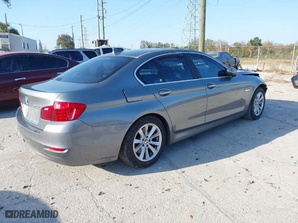 2014 BMW 5 Series 528i with VIN WBA5A5C57ED502024, listed as a IAAI auction lot 41611828 with 118,658 mi miles. Bid and sale history available at carsss.com. Image 4.