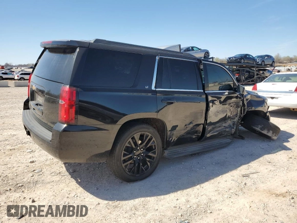 2015 Chevrolet Tahoe LT with VIN 1GNSCBKC0FR193894, listed as a Copart auction lot 49700495 with 179,127 mi miles and Salvage Title. Bid and sale history available at DreamBid. Image 3.