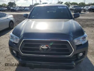 2020 Toyota Tacoma SR5 with VIN 3TMAZ5CN9LM125157, listed as a Copart auction lot 57178885 with 59,830 mi miles and Salvage title. Bid and sale history available at DreamBid. Image 5.