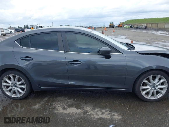 2014 Mazda 3 S Touring with VIN JM1BM1V31E1132448, listed as a IAAI auction lot 41815085 with 144,705 mi miles and . Bid and sale history available at DreamBid. Image 13.