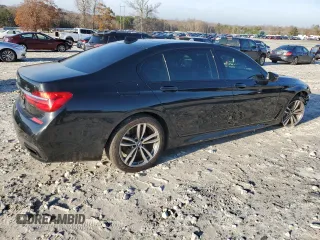 2016 BMW 7 Series 750i with VIN WBA7F0C5XGGL99048, listed as a Copart auction lot 84815364 with 96,743 mi miles and Salvage Title. Bid and sale history available at carsss.com. Image 3.
