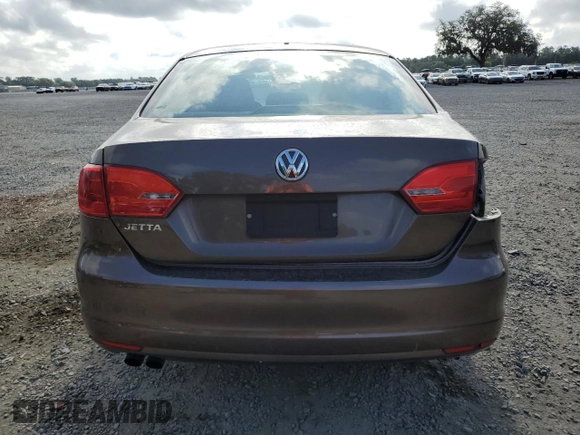 2014 Volkswagen Jetta S with VIN 3VW2K7AJXEM209993, listed as a Copart auction lot 54920565 with 130,466 mi miles and Clean title. Bid and sale history available at DreamBid. Image 6.