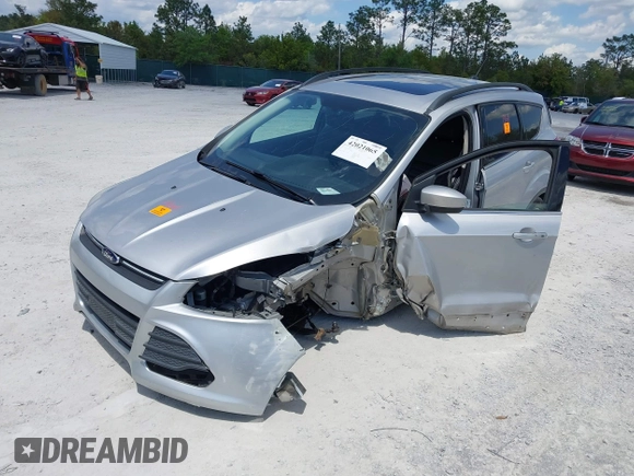 2016 Ford Escape SE with VIN 1FMCU9G92GUC28879, listed as a IAAI auction lot 42021065 with 99,184 mi miles. Bid and sale history available at carsss.com. Image 17.