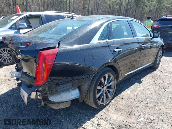 2014 Cadillac XTS with VIN 2G61L5S38E9202763, listed as a IAAI auction lot 41820564 with 117,709 mi miles. Bid and sale history available at carsss.com. Image 4.