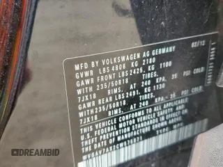 2012 Volkswagen Tiguan SE z VIN WVGAV7AX2CW575871, wystawiony jako Copart lot #58050865 z przebiegiem 96 569 mil mil oraz Szkody całkowita. Historia ofert i sprzedaży dostępna na DreamBid. Obrazek 13.