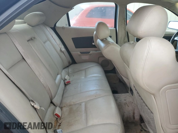 2004 Cadillac CTS with VIN 1G6DM577X40137669, listed as a Copart auction lot 58765364 with 206,751 mi miles and Salvage Title. Bid and sale history available at carsss.com. Image 10.