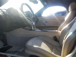 2007 BMW Z4 3.0i with VIN 4USBU33517LW72285, listed as a Copart auction lot 80830714 with 77,942 mi miles and Salvage Title. Bid and sale history available at carsss.com. Image 7.