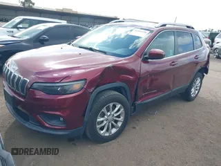 2019 Jeep Cherokee Latitude with VIN 1C4PJLCX5KD347695, listed as a IAAI auction lot 41910370 with 86,713 mi miles and . Bid and sale history available at carsss.com. Image 2.