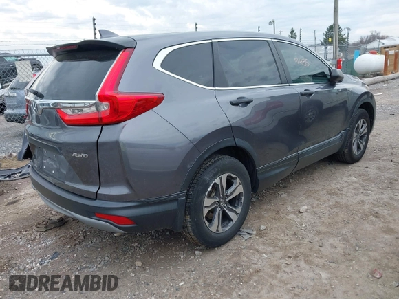 2017 Honda CR-V LX with VIN 2HKRW6H39HH210702, listed as a IAAI auction lot 41859435 with 126,532 mi miles. Bid and sale history available at carsss.com. Image 4.